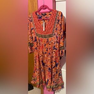 NWT. Peasant style long sleeve dress. Size XSP.